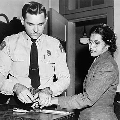 Rosa Parks, an African American, is arrested for disobeying an Alabama law requiring black passengers to relinquish seats to white passengers whenever the bus is full. Blacks are also required to sit at the back of the bus.