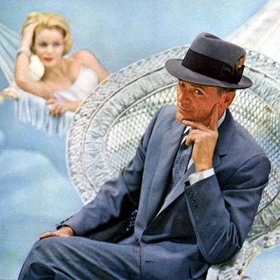 Men still wear hats in 1957. Detail from an advertisement for Dobbs Hats.
