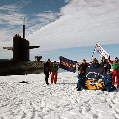 The nuclear submarine USS Nautilus sales under the North Pole.