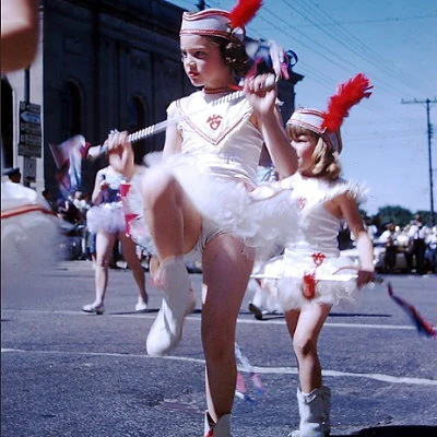 A young twirler marching in a Dixon, Illinois parade.