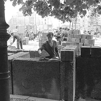 East Germany erects the Berlin Wall between East and West Berlin to halt the flood of refugees leaving the East. The wall would eventually stretch for 87 miles.