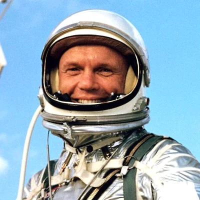 Astronaut John Glenn becomes the first American to orbit the earth.