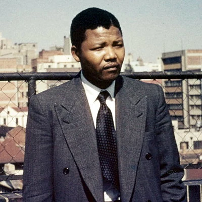 Anti-Apartheid activist Nelson Mandela is sentenced to life in prison for conspiring to overthrow the state.
