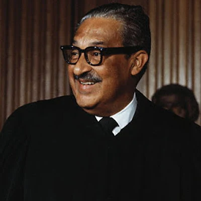 NAACP lawyer Thurgood Marshall is sworn in as first African American US Supreme Court justice, where he would serve until 1991.