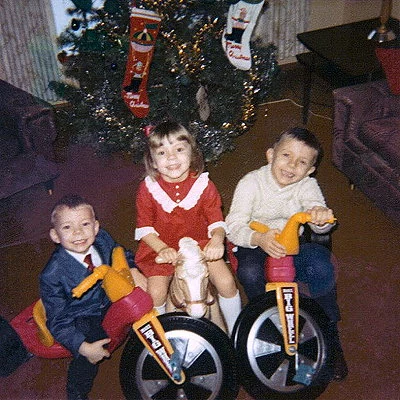 1968 family Christmas with Big Wheels - these low riding plastic tricycles were the latest thing at the time.