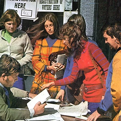 Young people register to vote as the US voting age is moved from 21 to 18 with the passage of the 26th Amendment. In the UK, the voting age is also reduced to 18.