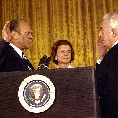 Vice President Gerald Ford is sworn in as the 38th US President following the resignation of Richard Nixon. A month later Ford grants Nixon a "full, free and absolute pardon".