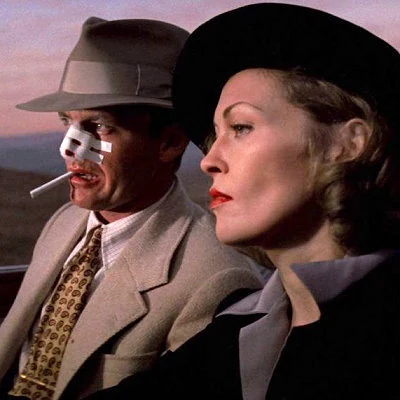 Faye Dunaway and Jack Nicholson in the 1974 noir film Chinatown, directed by Roman Polanski.