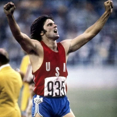 American athlete Bruce Jenner wins a gold medal in the decathlon at the 1976 Summer Olympics in Montreal.