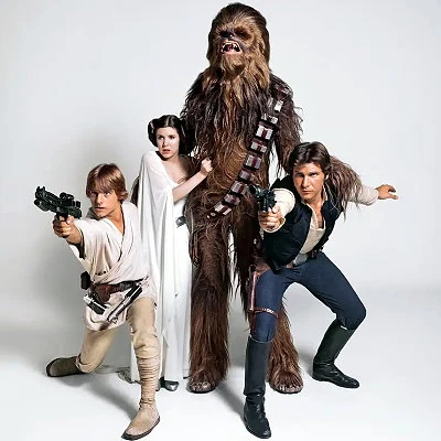 The epic space adventure film Star Wars is released in 1977 and becomes the highest grossing film to date. The film would generate two sequels and three prequels. The film series becomes a pop culture phenomenon with toys, costumes and other merchandising.