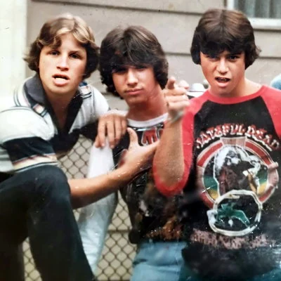 1980 boys looking tough for a photo.