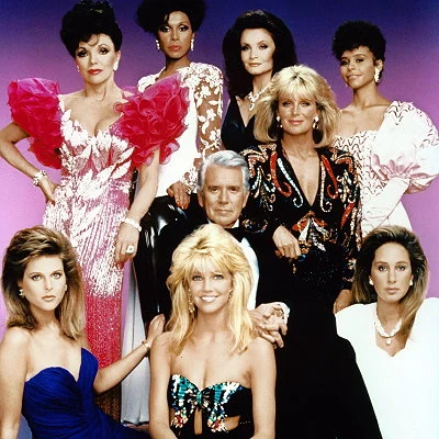 The primetime television soap opera Dynasty debuts on ABC in 1981. The show's ensemble cast includes John Forsythe, Linda Evans, Joan Collins and newcomer Heather Locklear among others. The program would air for nine seasons.