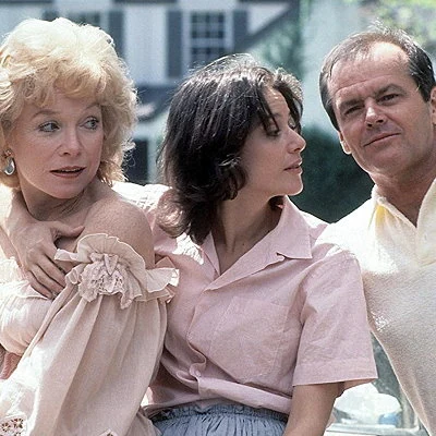 The comedy drama film Terms of Endearment is the second highest grossing film of 1983 and stars Shirley MacLaine, Debra Winger and Jack Nicholson. The film, based on the book by Larry McMurtry and written, produced and directed by James L. Brooks, wins five Academy Awards.