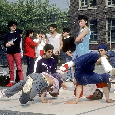Breakdancing outside a New York City high school.