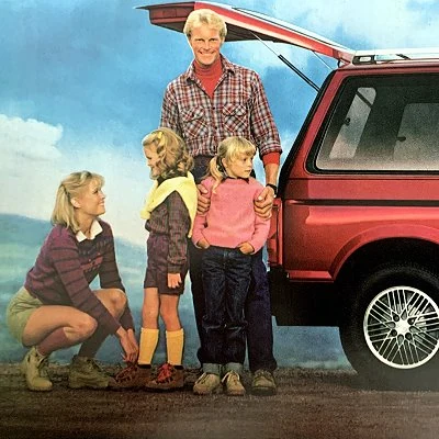 Detail from an advertisement for the 1984 Dodge Caravan.