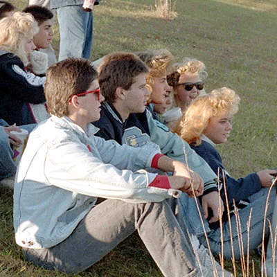 Kansas city kids at a high school sporting event.