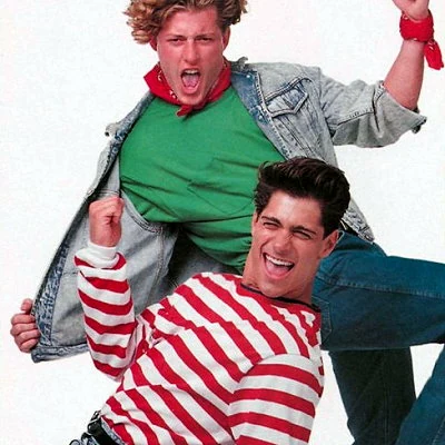 A 1990 advertisement for Kmart featuring the Wrangler and Britannia brands.