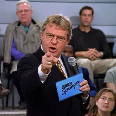 The Jerry Springer Show is a syndicated talk show that finds ratings gold with topics including incest, adultery and other controversial subjects. The show would air until 2018.