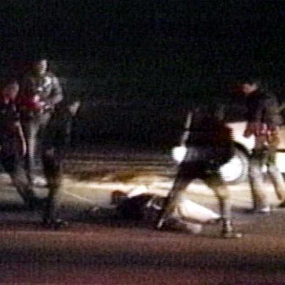 Rodney King is videotaped as he is being beaten by four Los Angeles police officers following a high speed chase. A subsequent trial finds two officers guilty of using Excessive Force and a civil lawsuit awards King $3.8 million.