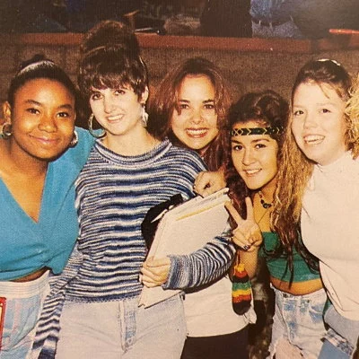 High school girls pose for the camera in Huntington Beach, California.