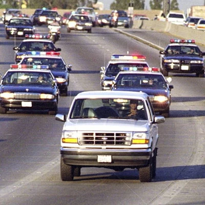 Pro football player and broadcaster O.J. Simpson is charged with the murders of his ex-wife Nicole Brown Simpson and her friend Ron Goldman. When Simpson fails to turn himself in, he is pursued by Los Angeles police in a low speed chase in a white Ford Bronco that is broadcast live on TV.