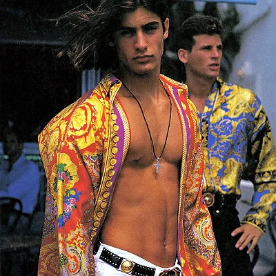 Men's fashion in an ad for Versace.