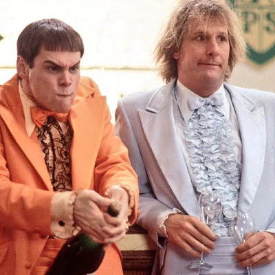 The film Dumb & Dumber, directed by Peter Farrelly, stars Jim Carrey and Jeff Daniels. The film is the 7th highest grossing film of 1994 in the U.S.