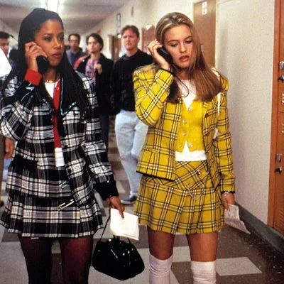 The film Clueless, a fictional look at Beverly Hills, California high school students, grosses $56 million. The film stars Alicia Silverstone, Brittany Murphy, Stacey Dash and Paul Rudd.