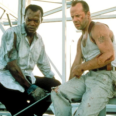 Die Hard With A Vengeance is the top grossing film of 1995. It is the third installment of the popular Die Hard action film series starring Bruce Willis and Samuel L. Jackson.