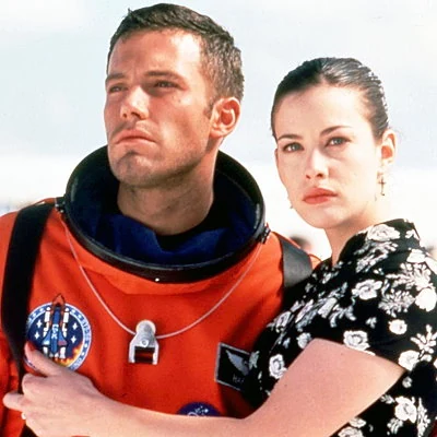 Despite poor reviews, the film Armageddon is the top US box office hit of the 1998. The sci-fi disaster film stars Ben Affleck, Liv Tyler and Bruce Willis.