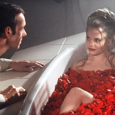 The black comedy drama American Beauty is about the mid-life crisis of an advertising executive, played by Kevin Spacey. The film also stars  Mena Suvari. Annette Bening and Thora Birch. The film won Oscar's for Best Picture, along with Best Director for Mendes, Best Actor for Spacey, Best Original Screenplay and Best Cinematography. 